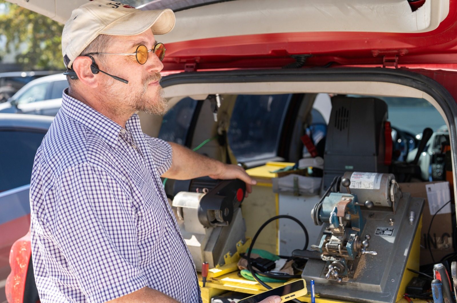 Mobile locksmith van workshop stocked with key blanks and cutting machines